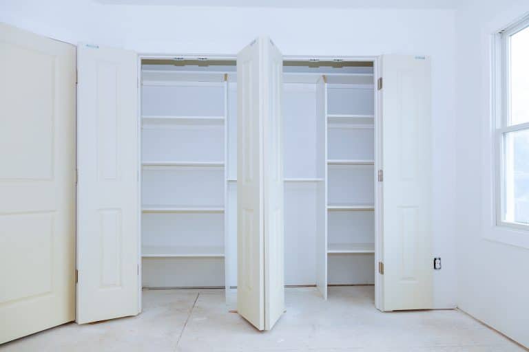 bi fold door, two white doors